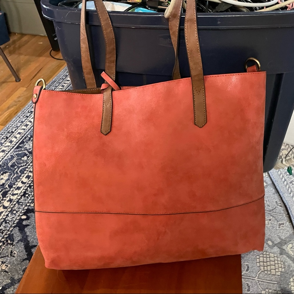 Salmon colored suede tote with smaller purse inside